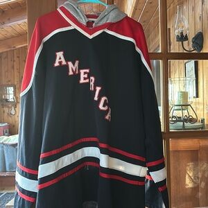 Great for pond hockey! America hockey jersey- X-LARGE. Hood sewn in for warmth!